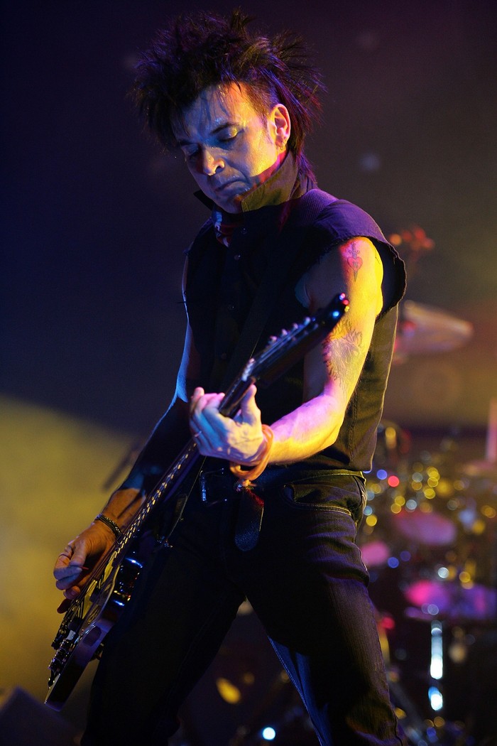 PERTH, AUSTRALIA - AUGUST 04: Simon Gallup of The Cure performs on stage at Challenge Stadium during their tour of Australia on August 4, 2007 in Perth, Australia  (Photo by Paul Kane/Getty Images)