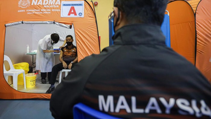 Foto: Krisis Politik-Corona di Malaysia yang Makin Menggila Perdana Menteri Malaysia Muhyiddin Yassin mengundurkan diri setelah kehilangan dukungan mayoritas di parlemen, menyusul ketidakpuasan publik dalam cara pemerintah menangani COVID.
