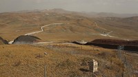 Seperti itulah penampakan tembok Turki yang dibangun untuk mencegah pengungsi Afghanistan masuk dari Iran. (AP/Emrah Gurel)
