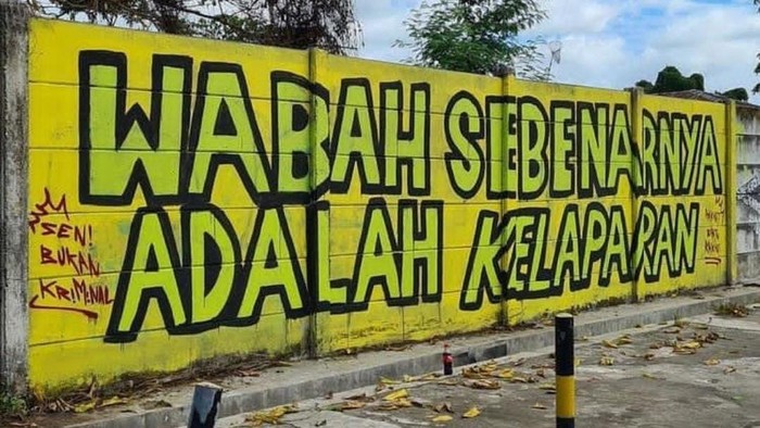 Mural bertuliskan Wabah Sebenarnya Adalah Kelaparan juga muncul di Kota Banjarmasin, Kalimantan Selatan (Kalsel). Mural tersebut telah dihapus Satpol PP. (dok Istimewa)