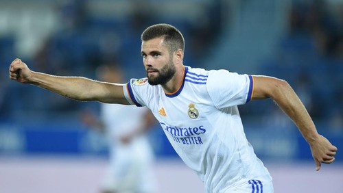 VITORIA-GASTEIZ, SPAIN - AUGUST 14: Nacho Fernandez of Real Madrid  celebrates after scoring their teams second goal during the LaLiga Santader match between Deportivo Alaves and Real Madrid CF at Estadio de Mendizorroza on August 14, 2021 in Vitoria-Gasteiz, Spain. (Photo by Juan Manuel Serrano Arce/Getty Images)