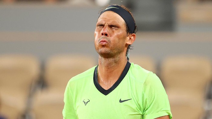 PARIS, FRANCE - JUNE 11: Rafael Nadal of Spain reacts during his Mens Singles Semi Final match against Novak Djokovic of Serbia on day Thirteen of the 2021 French Open at Roland Garros on June 11, 2021 in Paris, France. (Photo by Julian Finney/Getty Images)