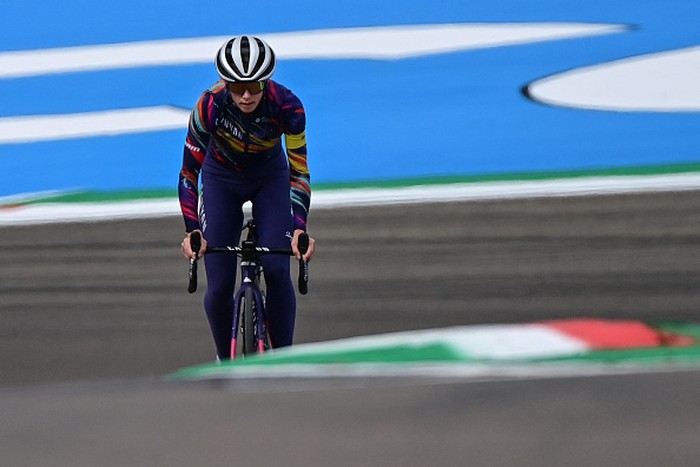 1262610003 NORTHAMPTON, ENGLAND - JULY 30: Valtteri Bottas of Finland and Mercedes GP and girlfriend and road cyclist Tiffany Cromwell cycle on track during previews ahead of the F1 Grand Prix of Great Britain at Silverstone on July 30, 2020 in Northampton, England. (Photo by Bryn Lennon/Getty Images)