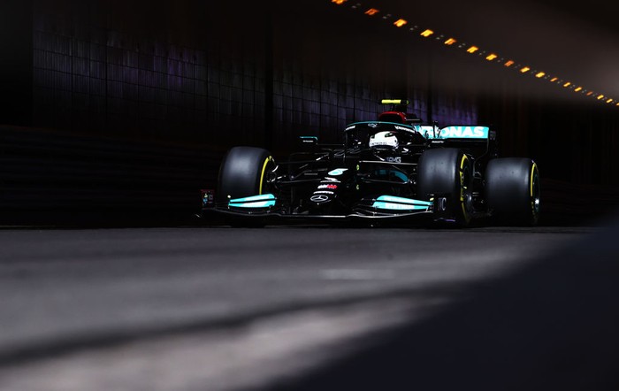 NORTHAMPTON, ENGLAND - JULY 30: Valtteri Bottas of Finland and Mercedes GP and girlfriend and road cyclist Tiffany Cromwell cycle on track during previews ahead of the F1 Grand Prix of Great Britain at Silverstone on July 30, 2020 in Northampton, England. (Photo by Bryn Lennon/Getty Images)