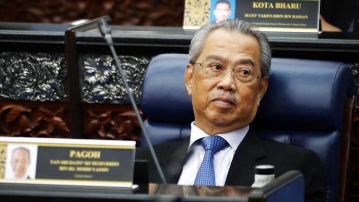 KUALA LUMPUR, MALAYSIA - MARCH 01: Muhyiddin Yassin, Malaysias newly appointed Prime Minister waves to the media outside his house with his family and supporters before departing for the swearing in ceremony at the palace on March 1, 2020 in Kuala Lumpur, Malaysia. (Photo by Ore Huiying/Getty Images)