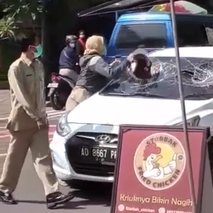 viral asn pecah kaca mobil