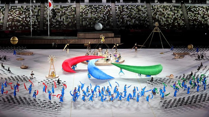 TOKYO, JAPAN - AUGUST 24: Performers dance during the opening ceremony of the Tokyo 2020 Paralympic Games at the Olympic Stadium on August 24, 2021 in Tokyo, Japan. (Photo by Naomi Baker/Getty Images)