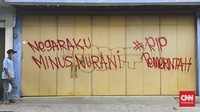 Mural Orang miskin dilarang sakit di Jalan Kusumoyudan, Kelurahan Stabelan, Kecamatan Banjarsari, Selasa (24/8). Rosyid/CNN Indonesia