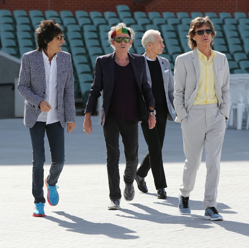 ADELAIDE, AUSTRALIA - OCTOBER 23:    Ronnie Wood, Keith Richards, Charlie Watts and Mick Jagger of the Rolling Stones walk onto the Adelaide Oval for a photo call for the media ahead of their Australian tour at Adelaide Oval on October 23, 2014 in Adelaide, Australia.  (Photo by Morne de Klerk/Getty Images)