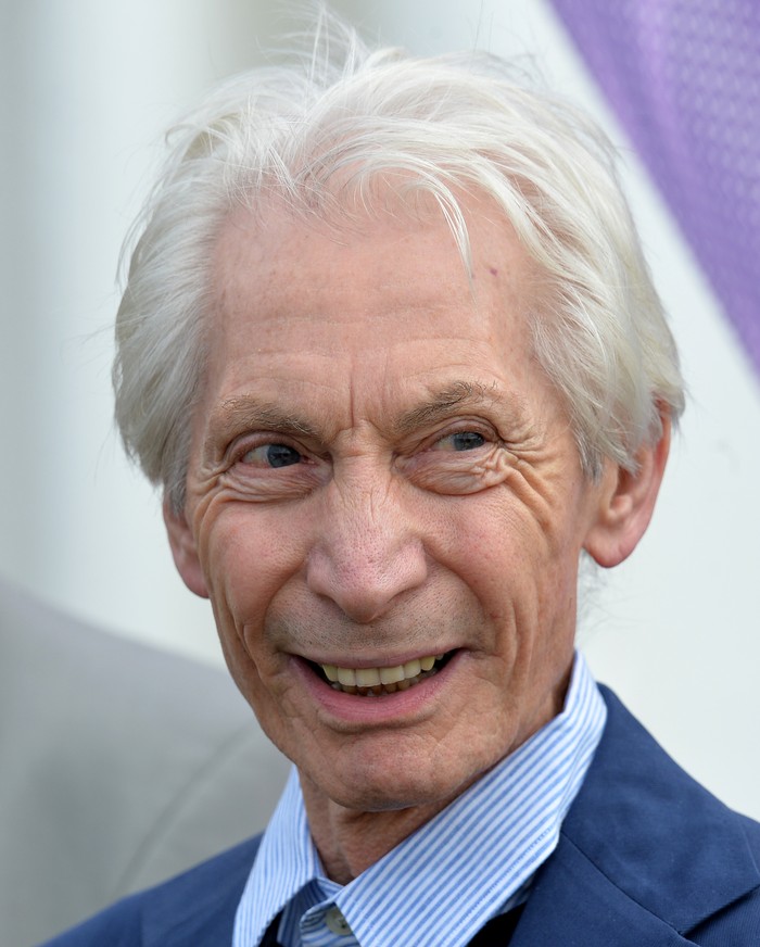 970909838 EDINBURGH, SCOTLAND - JUNE 10: Rolling Stones drummer Charlie Watts looks on during the One Day International match between Scotland and England at The Grange on June 10, 2018 in Edinburgh, Scotland. (Photo by Mark Runnacles/Getty Images)