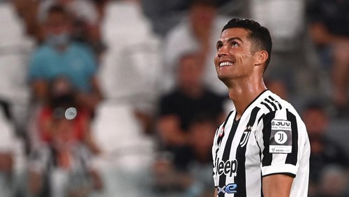 (FILES) This file photo taken on August 14, 2021 shows Juventus Portuguese forward Cristiano Ronaldo reacting during the friendly football match Juventus vs Atalanta at the Allianz Stadium in Turin on August 14, 2021. - To this day, Portuguese forward Cristiano Ronaldo is still playing for Juventus in the Serie A 2021-2022 championship. (Photo by MARCO BERTORELLO / AFP)
