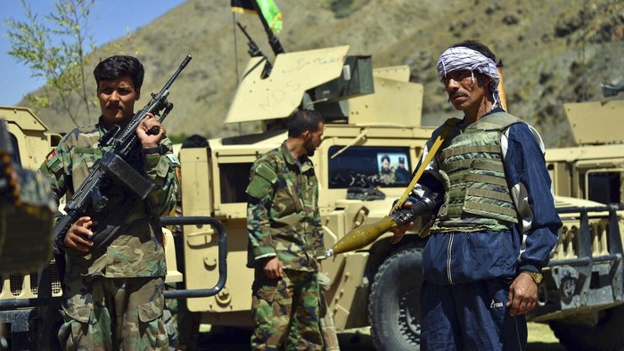 Afghanistan Militiamen loyal to Ahmad Massoud, son of the late Ahmad Shah Massoud, hold their weapons, in Panjshir province northeastern Afghanistan, Thursday, Aug. 26, 2021. The Panjshir Valley is the last region not under Taliban control following their stunning blitz across Afghanistan. Local fighters held off the Soviets in the 1980s and the Taliban a decade later under the leadership of Ahmad Shah Massoud, a guerrilla fighter who attained near-mythic status before he was killed in a suicide bombing. (AP Photo/Jalaluddin Sekandar)