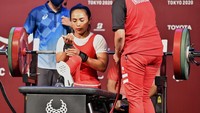 Widi, sapaan akrabnya menyabet medali perak di cabang olahraga angkat berat kelas 41 kilogram putri. Dok. NPC INDONESIA/NPC INDONESIA.