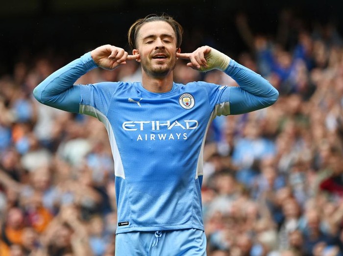 MANCHESTER, ENGLAND - AUGUST 21: Jack Grealish of Manchester City celebrates after scoring their side's second goal during the Premier League match between Manchester City and Norwich City at Etihad Stadium on August 21, 2021 in Manchester, England. (Photo by Shaun Botterill/Getty Images )