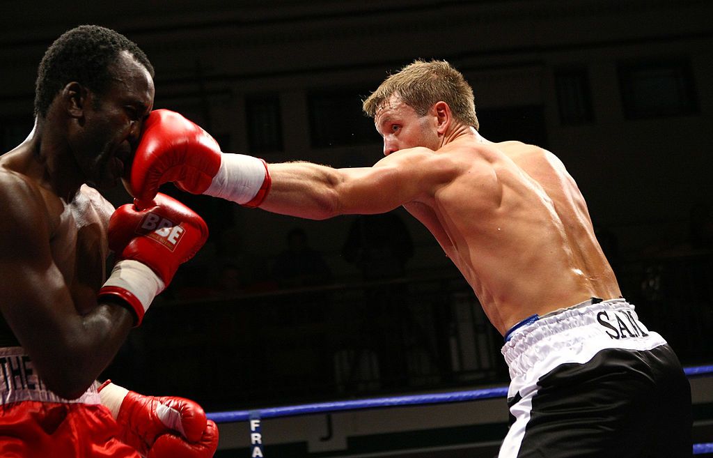 BELFAST, IRELAND - MAY 20:  Mehrdud Takaloo of Iran (L) connects with a jab against Eamonn Magee of Northern Ireland during the WBU Welterweight title fight between Eamonn Magee and Takaloo at the Kings Hall on May 20, 2006 in  Belfast, Ireland. (Photo by John Gichigi/Getty Images)