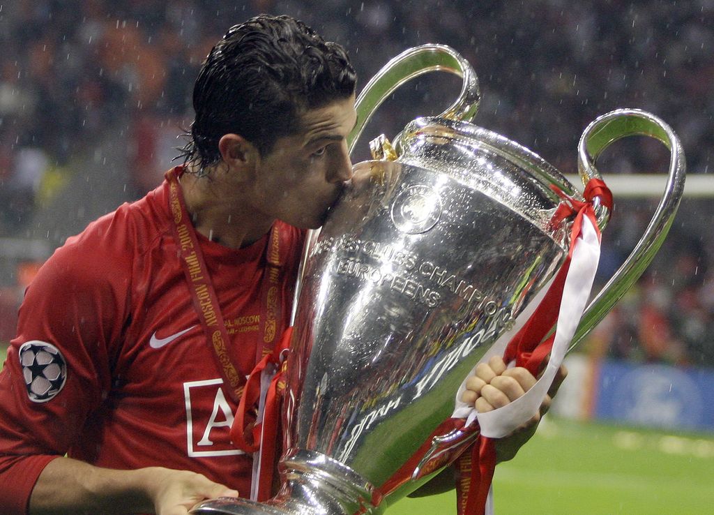 ** FILE ** In this May 21, 2008 file photo, Manchester United's Cristiano Ronaldo kisses the trophy at the end of the Champions League final soccer match at the Luzhniki Stadium in Moscow United could put Ronaldo up for sale in what would almost certainly be a world record transfer fee of about $119 million.  (AP Photo/Sergey Ponomarev, File)