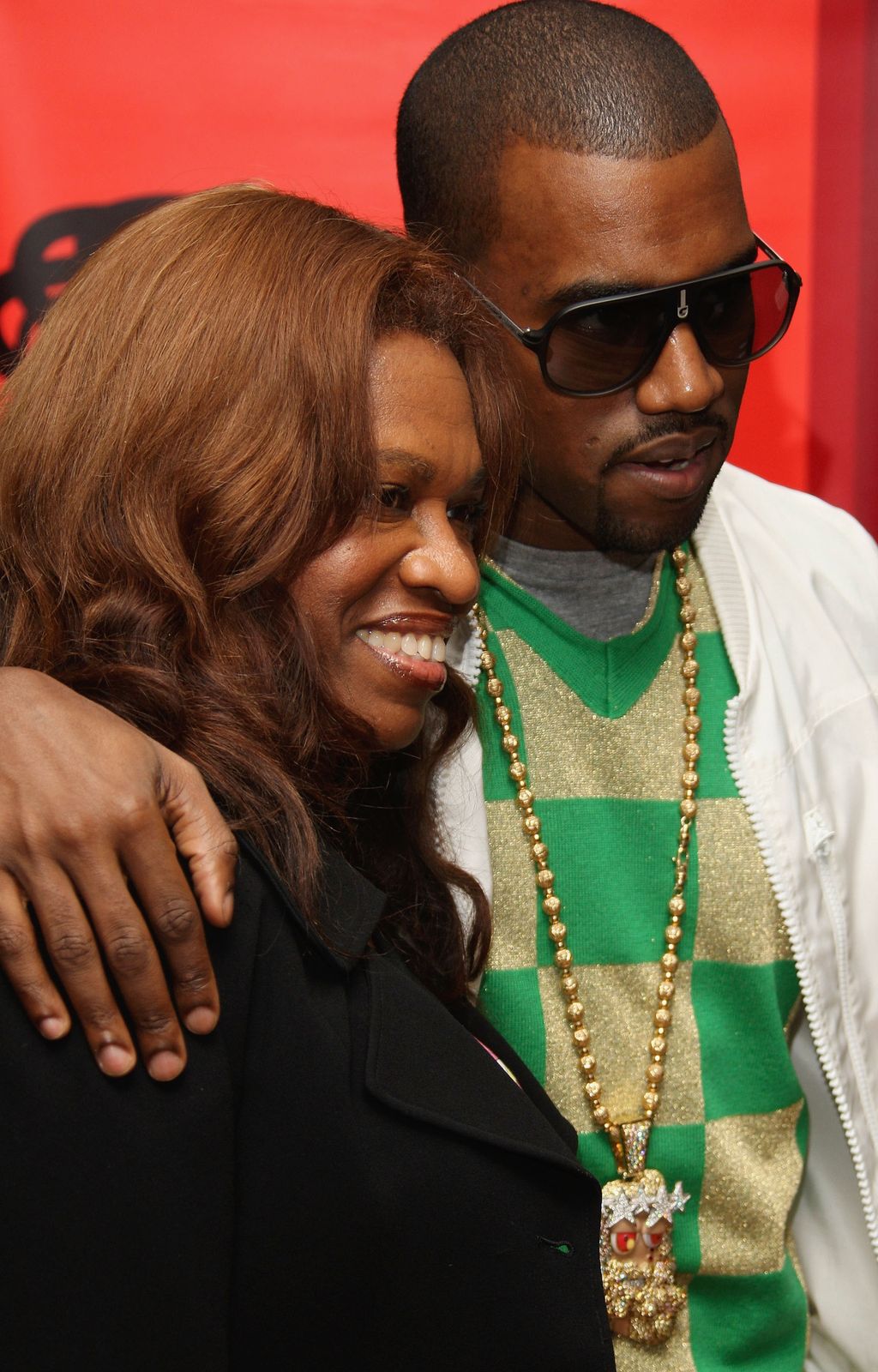 LONDON - JUNE 30:  US hip-hop star Kanye West poses with his mother Donda prior to signing copies of 'Raising Kanye: Life Lessons From The Mother Of A Hip-Hop Superstar' at Waterstones on June 30, 2007 in London.   (Photo by MJ Kim/Getty Images)