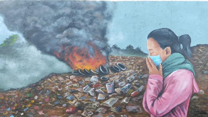 Mural yang dibuat Pemkab Bali untuk mengkritik pengelolaan sampah warga.