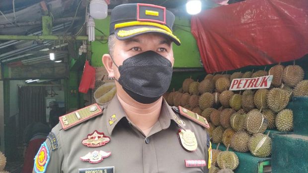 Kasatgas Pol PP Kelurahan Rambutan Bronson Sitompul