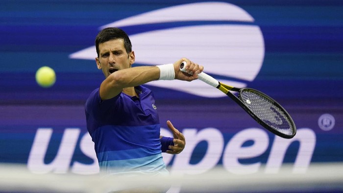 Novak Djokovic, of Serbia, returns a shot during the first round of the US Open tennis championships, Tuesday, Aug. 31, 2021, in New York. (AP Photo/Frank Franklin II)