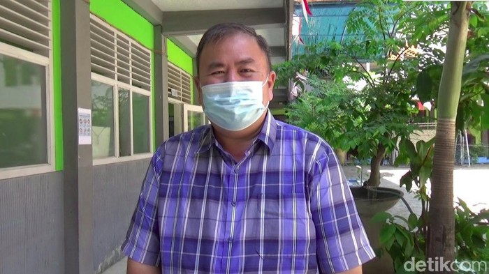 kepala smp swasta di surabaya