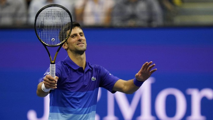 Novak Djokovic, of Serbia, reacts after hitting Tallon Griekspoor, of the Netherlands, with the ball while returning a shot during the second round of the US Open tennis championships, Thursday, Sept. 2, 2021, in New York. (AP Photo/Frank Franklin II)