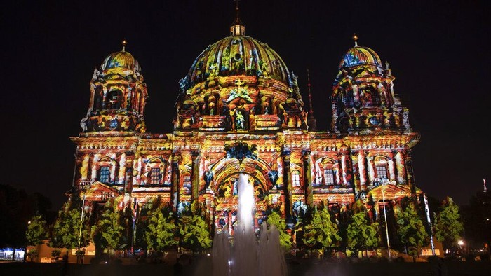 The Berlin Cathedral is illuminated during the rehearsal before the start of the 17th edition of the 