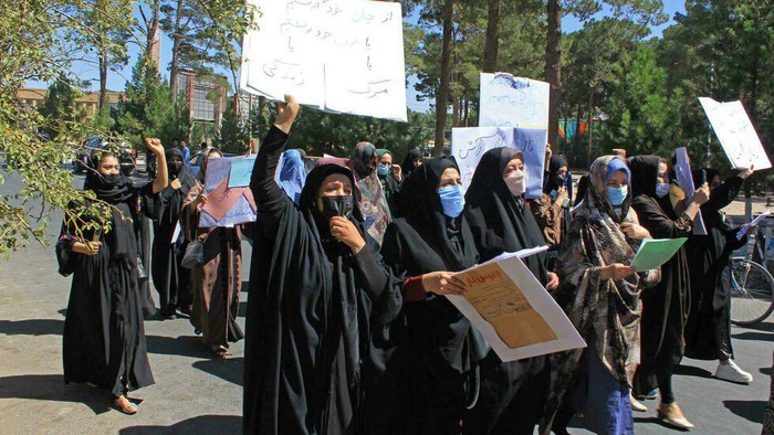 Around around 50 women took part in a rare protest in Herat -- unthinkable under the previous Taliban rule - AFP