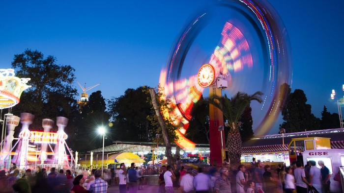 Izmir, Turkeyy - August 30, 2014: Amusement park and crowded people enjoying. Izmir international fair 2014. August 30 2014 Izmir Turkey