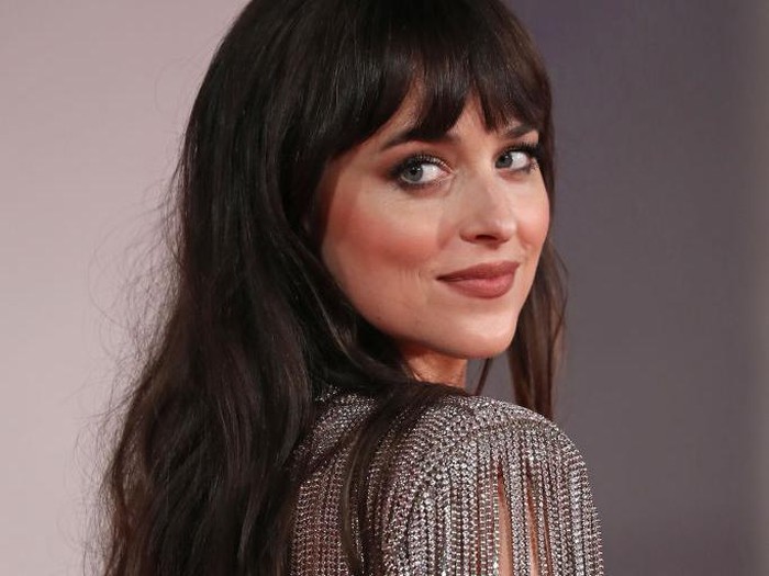 VENICE, ITALY - SEPTEMBER 03: Dakota Johnson attends the red carpet of the movie The Lost Daughter during the 78th Venice International Film Festival on September 03, 2021 in Venice, Italy. (Photo by Marc Piasecki/Getty Images for Netflix)