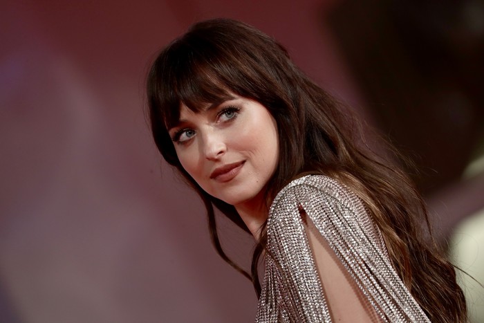 VENICE, ITALY - SEPTEMBER 03: Dakota Johnson attends the red carpet of the movie 