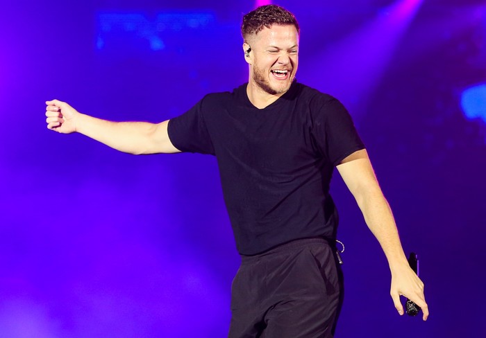 RIO DE JANEIRO, BRAZIL - OCTOBER 06: Dan Reynolds of Imagine Dragons performs on stage during Rock in Rio 2019 - Day 7 at Cidade do Rock on October 06, 2019 in Rio de Janeiro, Brazil. (Photo by Alexandre Schneider/Getty Images)