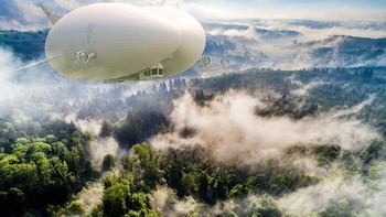 Hasil rekaan artis Airlander 10 mengudara di atas hutan yang luas. Foto: Hybrid Air Vehicles