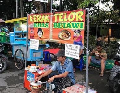 Eks Peserta IMB, Cak Mat 'Klantink' Kini Sukses Jualan Kerak Telor di Surabaya