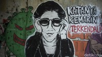 Salah satu muralnya yang ada di Bogor ini bergambarkan seorang sosok mirip mantan Menteri Kelautan dan Perikanan Susi Pudjiastuti dengan tulisan Katanya Kemarin Terkendali yang menyindir penyataan Menko Marves Luhut saat mengatakan kasus COVID di Indonesia terkendali, tapi nyatanya? 