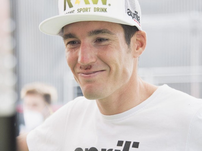 SPIELBERG, AUSTRIA - AUGUST 12: Aleix Espargaro of Spain and Aprilia Racing Team Gresini  speaks with fans during the MotoGP KTM activation event in paddock during the MotoGP of Austria - Previews  at Red Bull Ring on August 12, 2021 in Spielberg, Austria. (Photo by Mirco Lazzari gp/Getty Images)