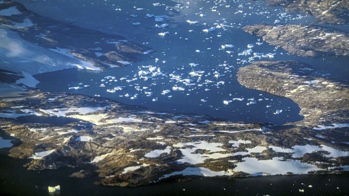 Melting glacier ice and icebergs are pictured at the east coast in, Greenland, September 4, 2021. REUTERS/Hannibal Hanschke