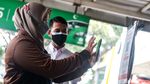 Uji Coba Aplikasi PeduliLindungi untuk Penumpang KRL