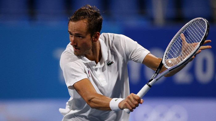 TOKYO, JAPAN - JULY 29: Daniil Medvedev of Team ROC plays a backhand during his Mens Singles Quarterfinal match against Pablo Carreno Busta of Team Spain on day six of the Tokyo 2020 Olympic Games at Ariake Tennis Park on July 29, 2021 in Tokyo, Japan. (Photo by Tim de Waele/Getty Images)
