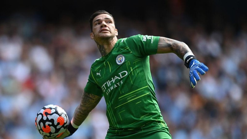 MANCHESTER, ENGLAND - JULY 26:  Ederson of Manchester City  holds the Golden Glove Award and Kevin De Bruyne of Manchester City holds the Playmaker Award  after the Premier League match between Manchester City and Norwich City at Etihad Stadium on July 26, 2020 in Manchester, England.Football Stadiums around Europe remain empty due to the Coronavirus Pandemic as Government social distancing laws prohibit fans inside venues resulting in all fixtures being played behind closed doors. (Photo by Shaun Botterill/Getty Images)