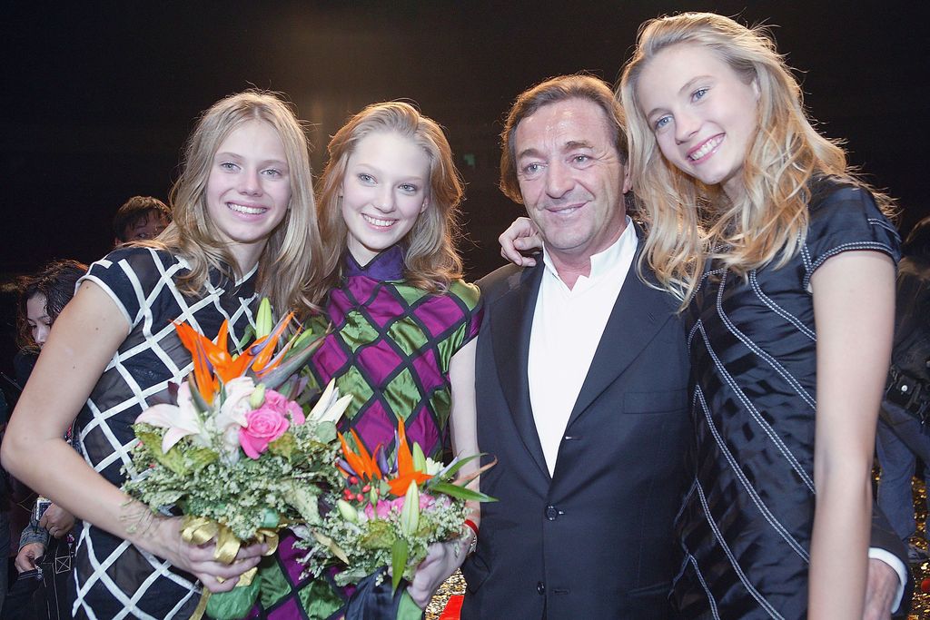 SHANGHAI, CHINA - NOVEMBER 12: (CHINA OUT) (L-R) Johanna Jonsson of Sweden, Charlotte Belliard of France, Gerald Marie, President of Elite Group and Sasha Gachulincova of Slovakia pose for pictures after the world final of the Elite Model Look 2005 competition on November 12, 2005 in Shanghai, China. Charlotte Belliard, Sasha Gachulincova and Johanna Jonsson respectively won the competition, 1st runner-up and 2nd runner-up of the event. (Photo by China Photos/Getty Images)