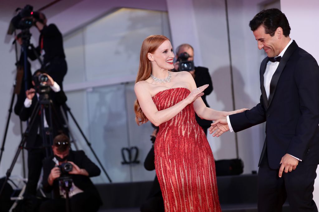 VENICE, ITALY - SEPTEMBER 04: Jessica Chastain and Oscar Isaac attend the red carpet of the movie 