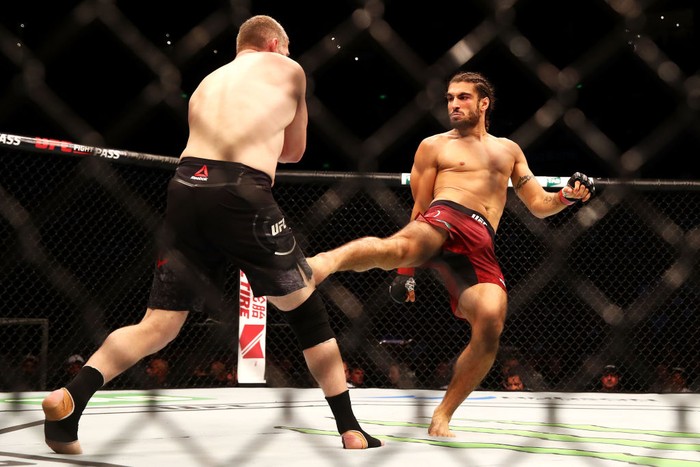 SYDNEY, AUSTRALIA - NOVEMBER 19: Elias Theodorou (R) of Canada kicks Daniel Kelly (R) of Australia in their middleweight bout during the UFC Fight Night at Qudos Bank Arena on November 19, 2017 in Sydney, Australia. (Photo by Mark Kolbe/Getty Images)