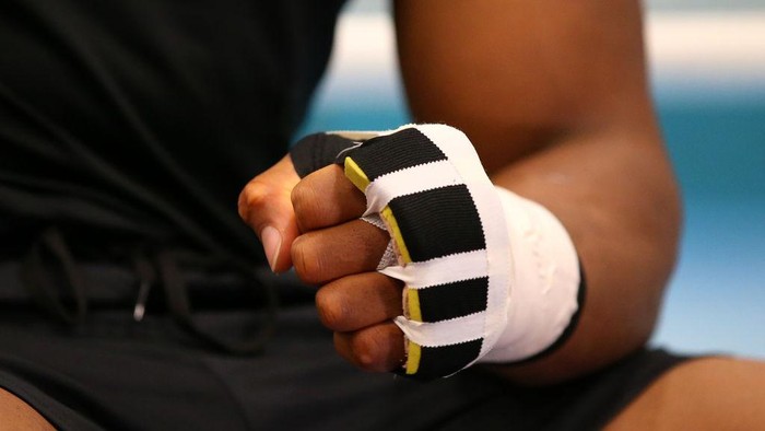 SHEFFIELD, ENGLAND - MAY 01: A detail shot of Anthony Joshuas fist is seen as he tapes up prior to a training session during the Anthony Joshua Media Day at the English Institute of Sport on May 01, 2019 in Sheffield, England. (Photo by Alex Livesey/Getty Images)