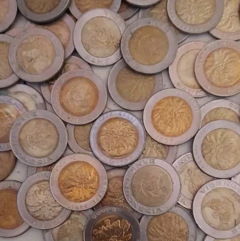 Uang Koin 1000 rupiah kelapa sawit. Ist
