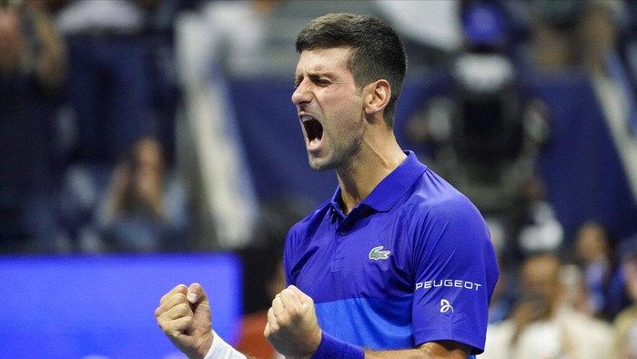 Novak Djokovic, of Serbia, reacts after defeating Alexander Zverev, of Germany, during the semifinals of the US Open tennis championships, Friday, Sept. 10, 2021, in New York. (AP Photo/John Minchillo)