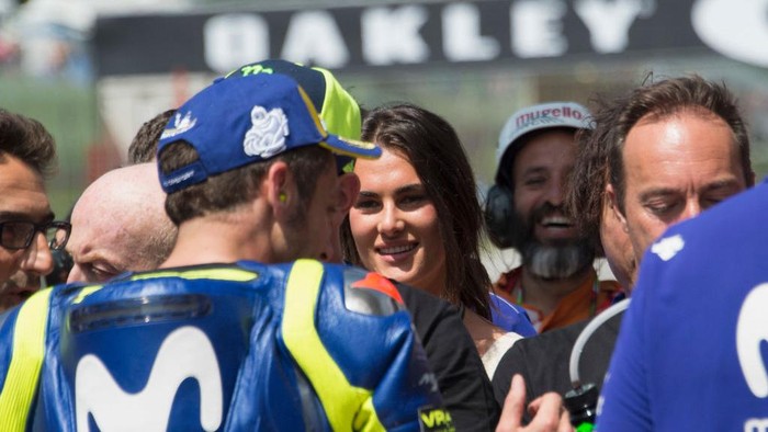SCARPERIA, ITALY - JUNE 02:  Valentino Rossi of Italy and Movistar Yamaha MotoGP celebrates the MotoGP pole position with team and girlfriend (Francesca Novello of Italy) at the end of the qualifying practice during the MotoGp of Italy - Qualifying at Mugello Circuit on June 2, 2018 in Scarperia, Italy.  (Photo by Mirco Lazzari gp/Getty Images)