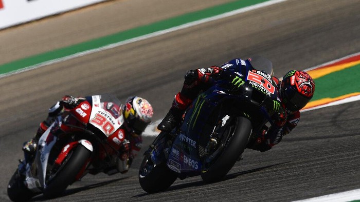 Fabio Quartararo of France leads Takaaki Nakagami of Japan round a corner during the Alcaniz Aragon Moto GP race at the MotorLand Aragon circuit, in Alcaniz, Spain Sunday, Sept. 12, 2021. (AP Photo/Jose Breton)