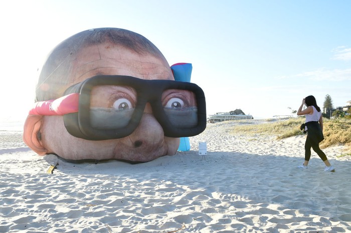 CURRUMBIN, AUSTRALIA - SEPTEMBER 13: Sculpture by Danger Dave titled 'Damien Hirst Looking for Sharks' is seen on September 13, 2021 in Currumbin, Australia. SWELL Sculpture Festival is an annual exhibition that features 65 large-scale sculptures installed along Currumbin Beach on the Gold Coast in Queensland. (Photo by Matt Roberts/Getty Images)