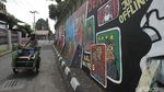 Mural Perdagangan Monyet Mejeng di Yogyakarta